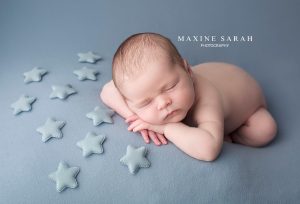 newborn photographer coventry baby stars and blue background
